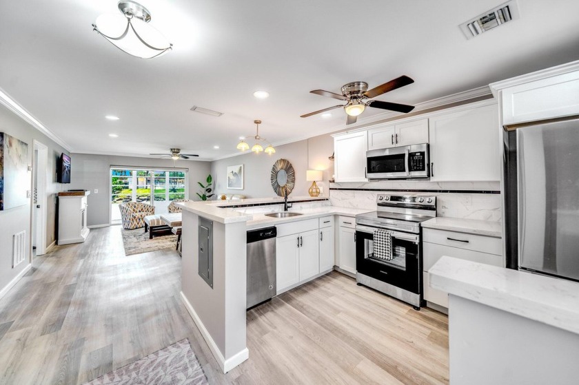 GORGEOUS 2 BEDROOM, 2 BATH VILLA WITH SPECTACULAR - Beach Home for sale in West Palm Beach, Florida on Beachhouse.com