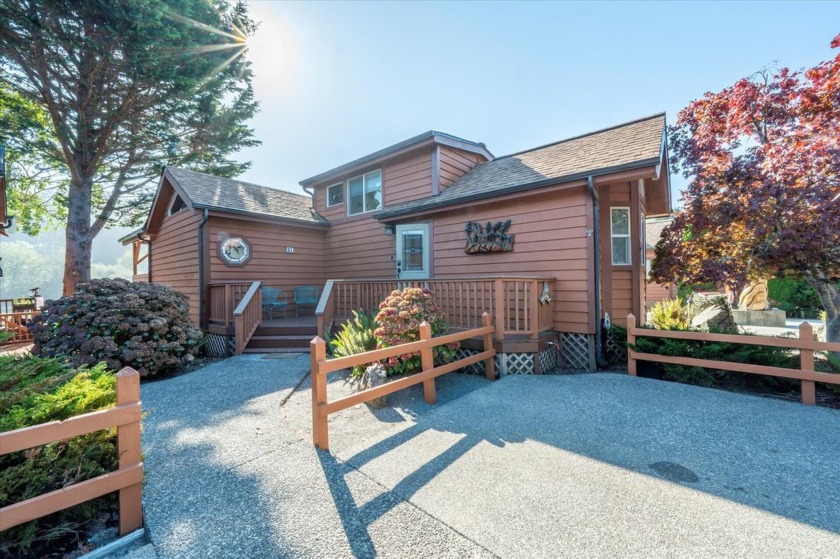 Escape to this cozy riverfront cabin where nature and - Beach Home for sale in Brookings, Oregon on Beachhouse.com