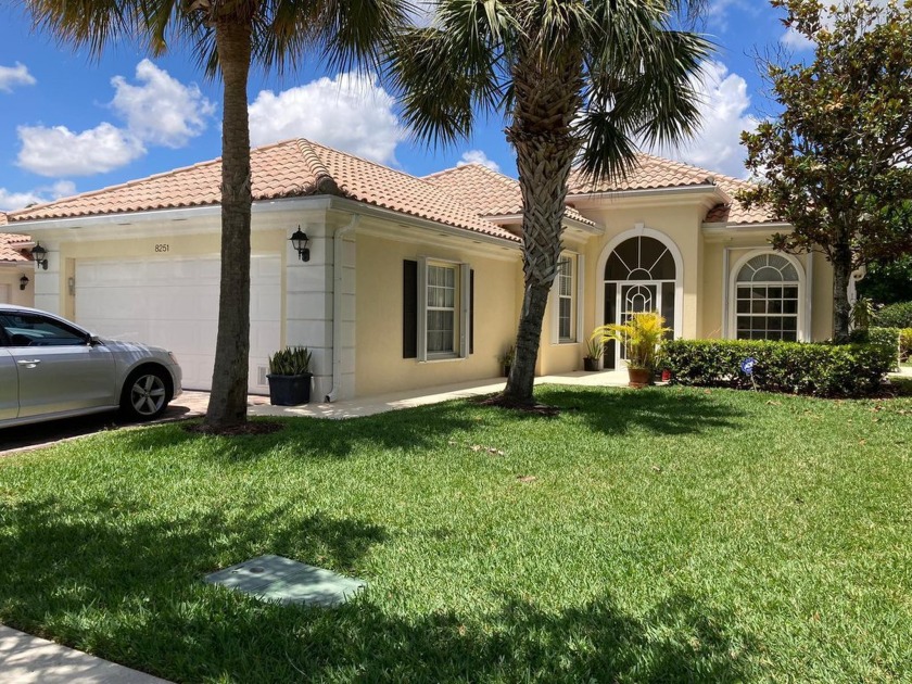 Immerse yourself in the serene allure of lakeside living within - Beach Home for sale in Wellington, Florida on Beachhouse.com