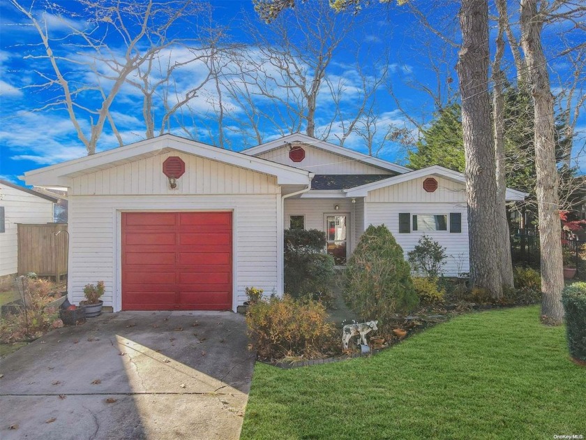 This charming, solid-built cinder block home on the lake offers - Beach Home for sale in Ridge, New York on Beachhouse.com