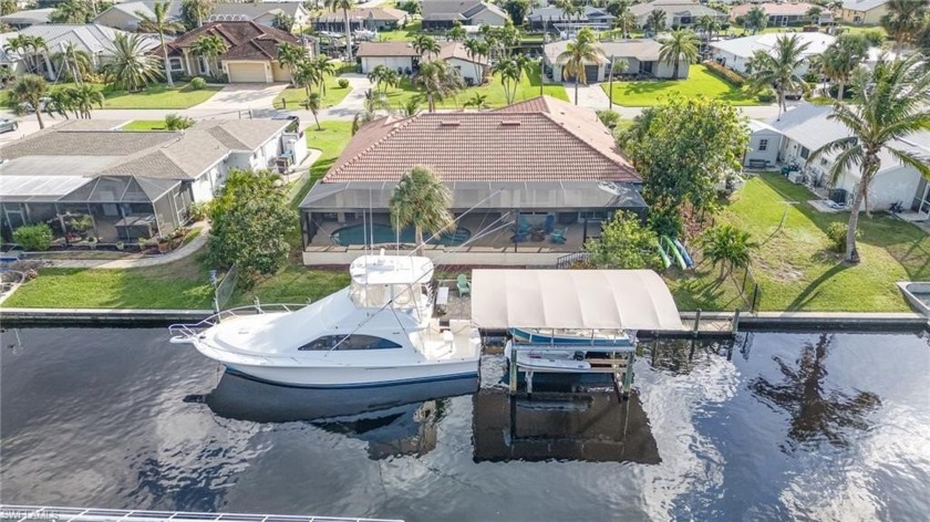 Nestled in South Cape Coral, this exceptional waterfront pool - Beach Home for sale in Cape Coral, Florida on Beachhouse.com