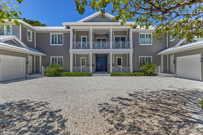 On over a half-acre, this stately custom-built estate in - Beach Home for sale in Manalapan, Florida on Beachhouse.com