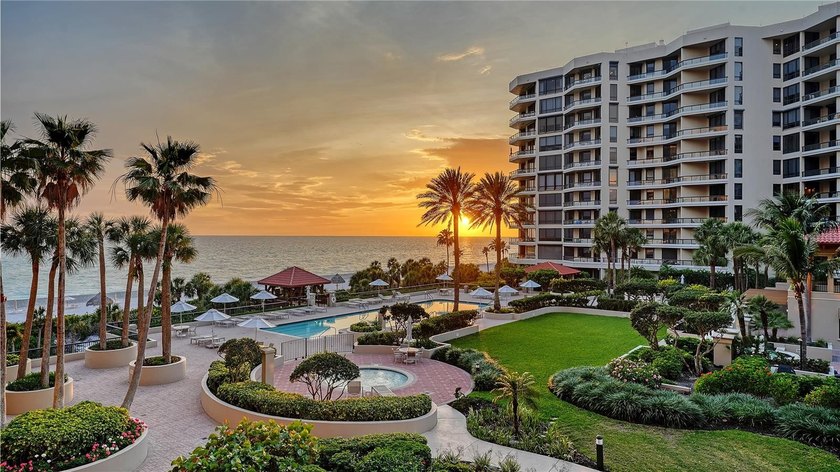 Framed by sweeping Gulf sunset views and the manicured grounds - Beach Condo for sale in Longboat Key, Florida on Beachhouse.com