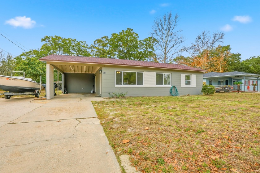 Discover modern coastal living in this stunningly renovated - Beach Home for sale in Fort Walton Beach, Florida on Beachhouse.com