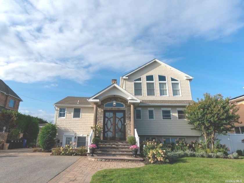 Experience the ultimate in waterfront luxury with this - Beach Home for sale in West Islip, New York on Beachhouse.com