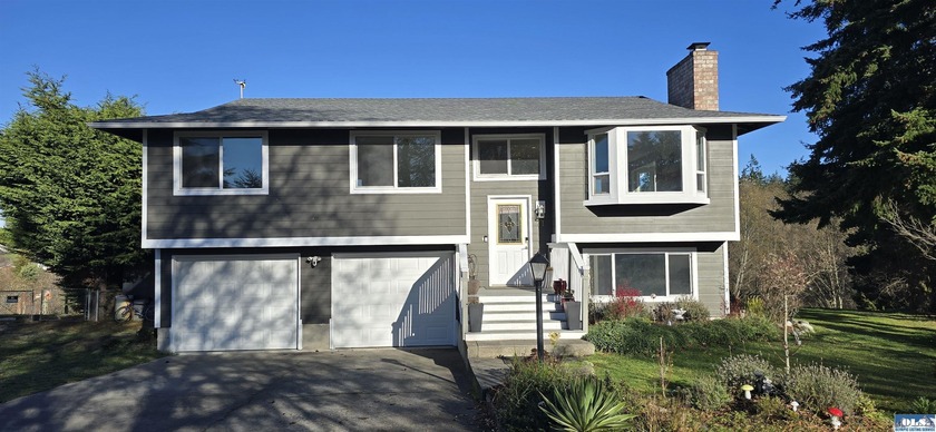 Remodeled in 2022, this pristine split-level home offers sublime - Beach Home for sale in Sequim, Washington on Beachhouse.com