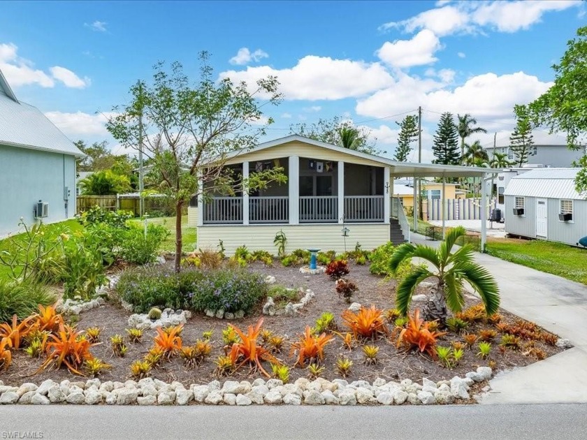 Pristine this 2021 newer home 2/2 features an open floor plan - Beach Home for sale in Goodland, Florida on Beachhouse.com