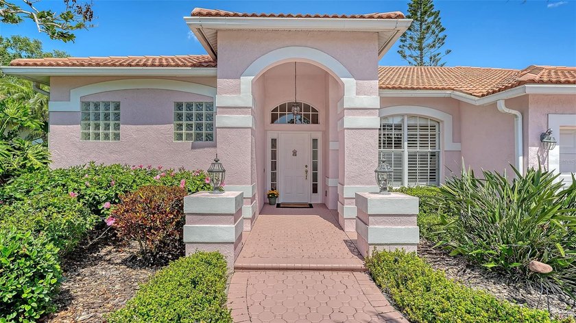 Welcome to this MOVE-IN READY HOME! Elegant, bright and - Beach Home for sale in Sarasota, Florida on Beachhouse.com