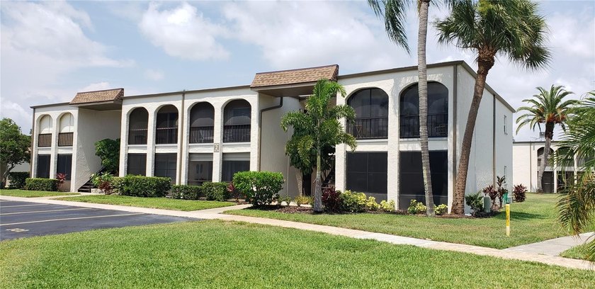 Welcome to this beautifully maintained second-floor corner unit - Beach Condo for sale in Seminole, Florida on Beachhouse.com