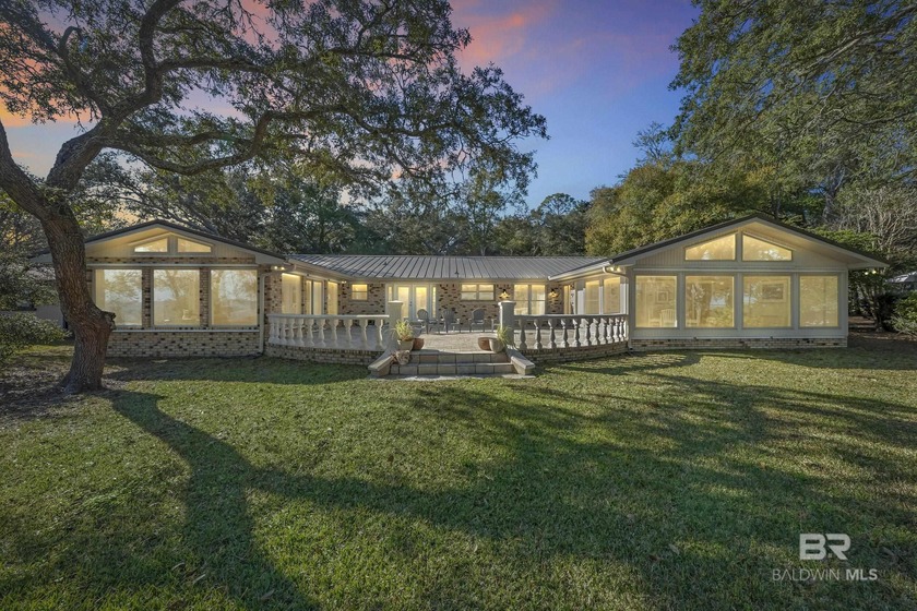 On glistening Perdido Bay, nestled in a live oak hammock with - Beach Home for sale in Lillian, Alabama on Beachhouse.com