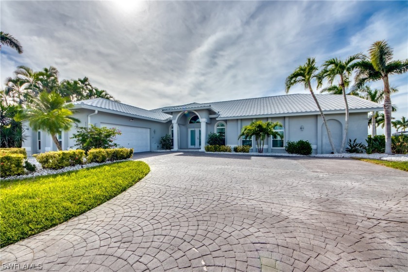 Stunning Gulf Access home with 200ft of waterfront, situated on - Beach Home for sale in Cape Coral, Florida on Beachhouse.com