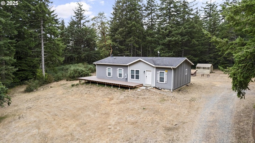 Nestled on 2.5 private acres, this completely remodeled 3 - Beach Home for sale in Bandon, Oregon on Beachhouse.com