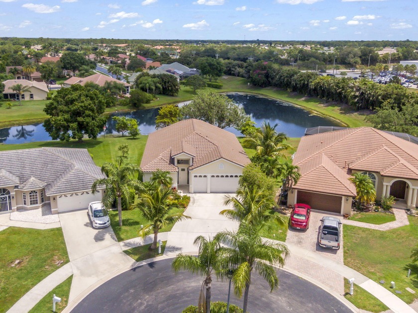 Welcome to this rare lakefront home on a cul-de-sac in the heart - Beach Home for sale in Port Saint Lucie, Florida on Beachhouse.com