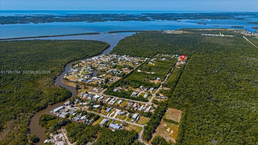 Double lot waterfront opportunity being offered together at 25 & - Beach Home for sale in Everglades City, Florida on Beachhouse.com