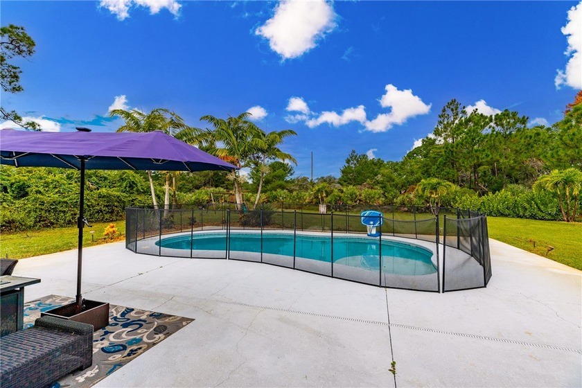 POOL HOME, NO HOA, & .60 acres !!!!!!!!! This private 3-bedroom - Beach Home for sale in Vero Beach, Florida on Beachhouse.com