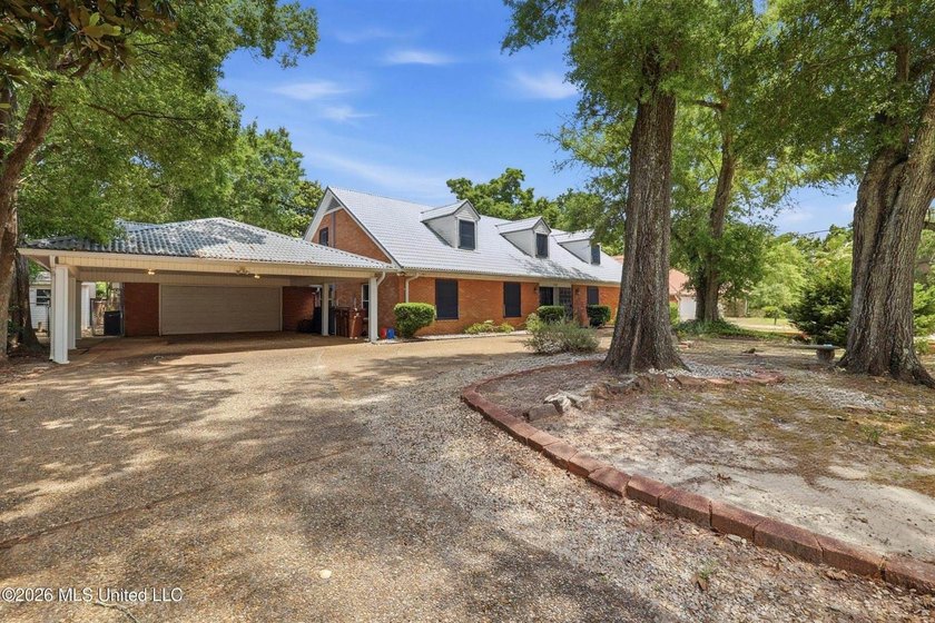 Coastal living meets spacious luxury in this 6-bedroom, 4-bath - Beach Home for sale in Biloxi, Mississippi on Beachhouse.com