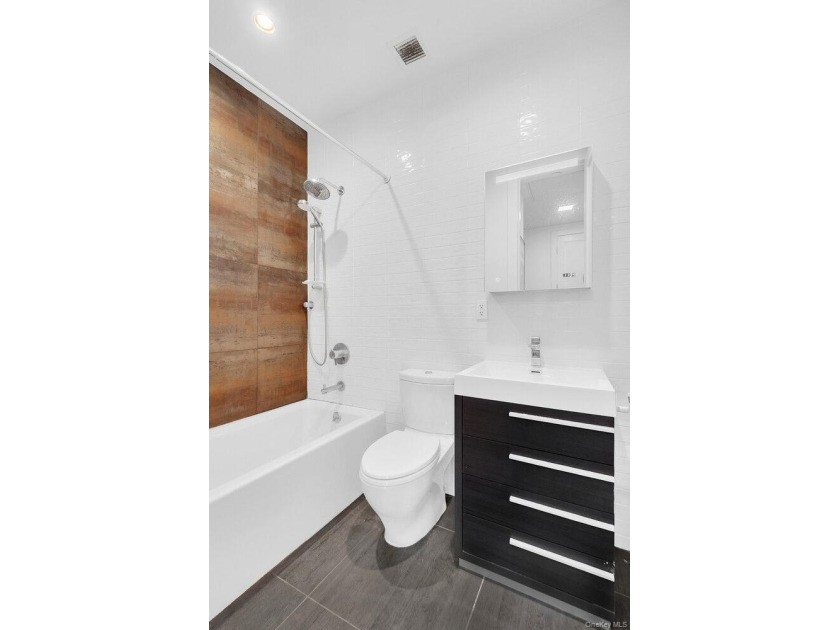 Just listed: a beautiful one-bedroom with a private roof deck in - Beach Condo for sale in Queens, New York on Beachhouse.com