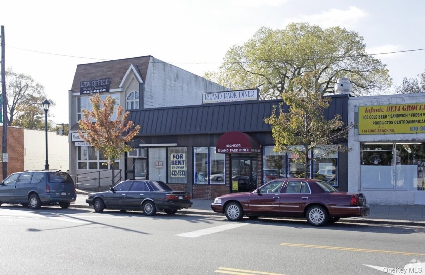 SELLING THE BUILDIING: #106 -Storefront ( D2E Studio) and - Beach Lot for sale in Island Park, New York on Beachhouse.com