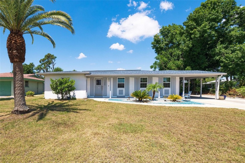 WATERFRONT 3 Bedroom, 2 Bathroom, 1-Car Carport home with a - Beach Home for sale in Port Charlotte, Florida on Beachhouse.com