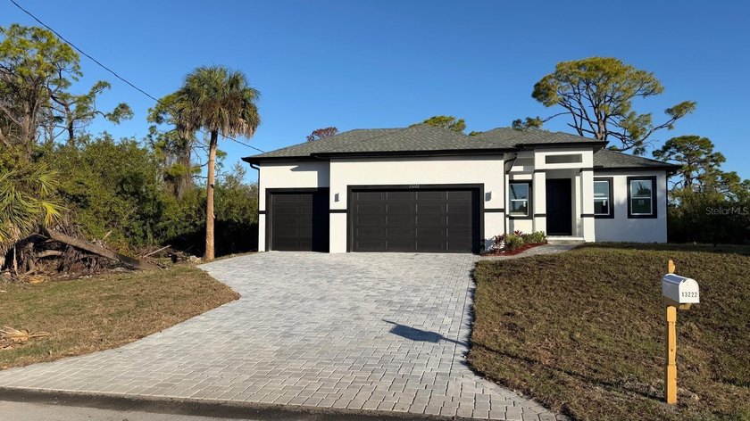 Welcome to this stunning brand-new home! ADJACENT LOT AVAILABLE - Beach Home for sale in Port Charlotte, Florida on Beachhouse.com