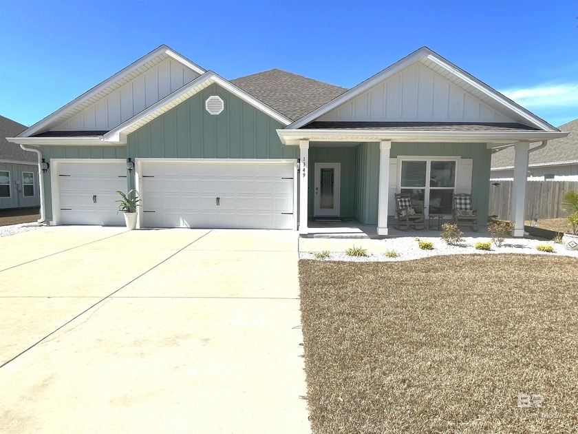 Pool Home with Front Porch Charm & Tropical Backyard Oasis! Gold - Beach Home for sale in Gulf Shores, Alabama on Beachhouse.com