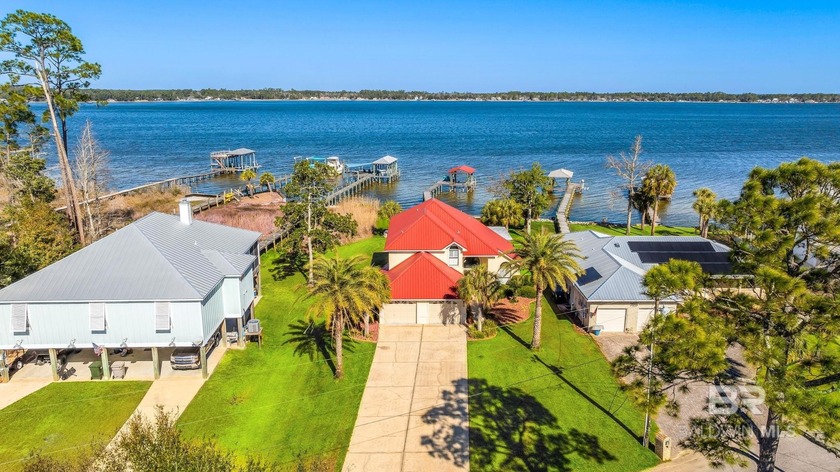 Experience true waterfront living at this stunning retreat on - Beach Home for sale in Pensacola, Florida on Beachhouse.com