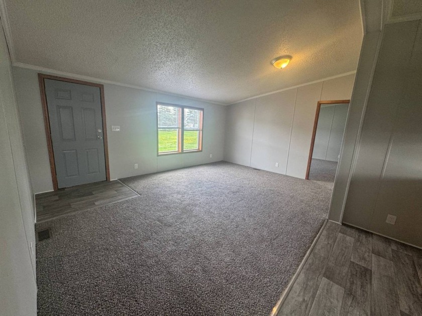 Nestled on a sprawling lot with beautiful pond views, this - Beach Home for sale in Newport, Michigan on Beachhouse.com