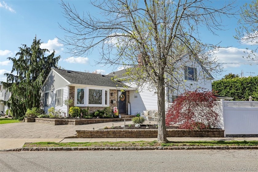 Located in the sought-after Nassau Shores section of Massapequa - Beach Home for sale in Massapequa, New York on Beachhouse.com
