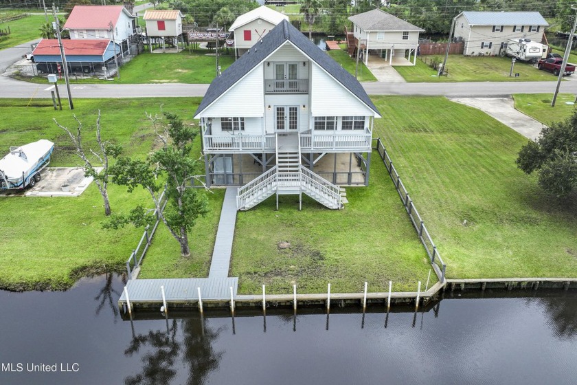 FULLY FURNISHED SHORT TERM RENTAL on the water with a total of 3 - Beach Home for sale in Bay Saint Louis, Mississippi on Beachhouse.com