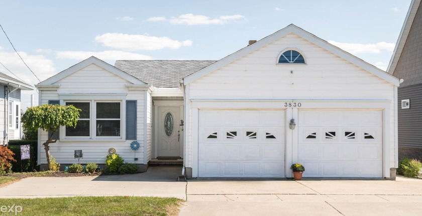 Wake up to stunning views of the St. Clair River in this - Beach Home for sale in Port Huron, Michigan on Beachhouse.com