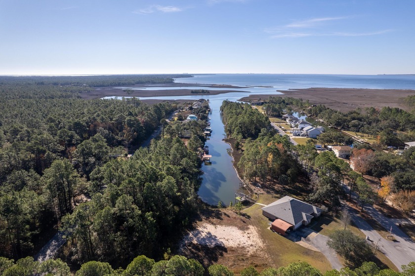 This wooded homesite provides a natural setting with mature - Beach Lot for sale in Milton, Florida on Beachhouse.com