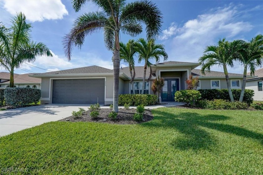 Southern Facing, Gulf access pool home with amazing curb appeal - Beach Home for sale in Cape Coral, Florida on Beachhouse.com