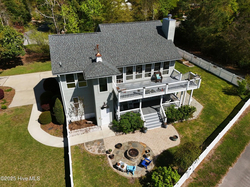 Stunning 4-bedroom, 3.5-bathroom home nestled on Hole 15 of the - Beach Home for sale in Morehead City, North Carolina on Beachhouse.com
