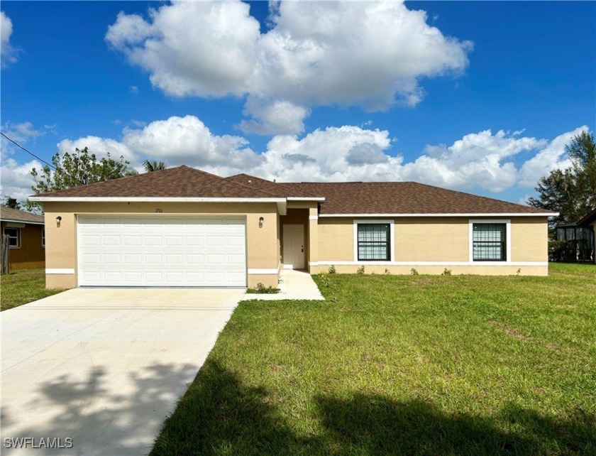 BRAND NEW CANAL FRONT 3 BED 2 BATH 2 CAR GARAGE AILL TILED HOME - Beach Home for sale in Cape Coral, Florida on Beachhouse.com