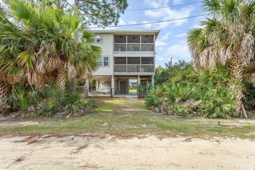 Enjoy Gulf Coast living at its finest in this elevated 2-bedroom - Beach Home for sale in Alligator Point, Florida on Beachhouse.com