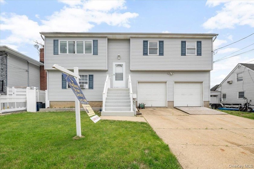 Attention All Boaters! This Updated Wideline Waterfront Hi-Ranch - Beach Home for sale in Freeport, New York on Beachhouse.com