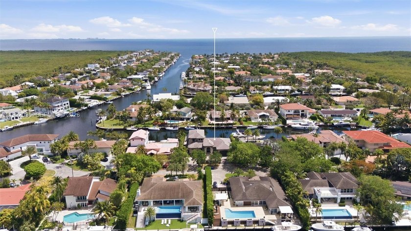 GORGEOUS GATED WATERFRONT ESTATE in Gables By The Sea. This - Beach Home for sale in Coral Gables, Florida on Beachhouse.com
