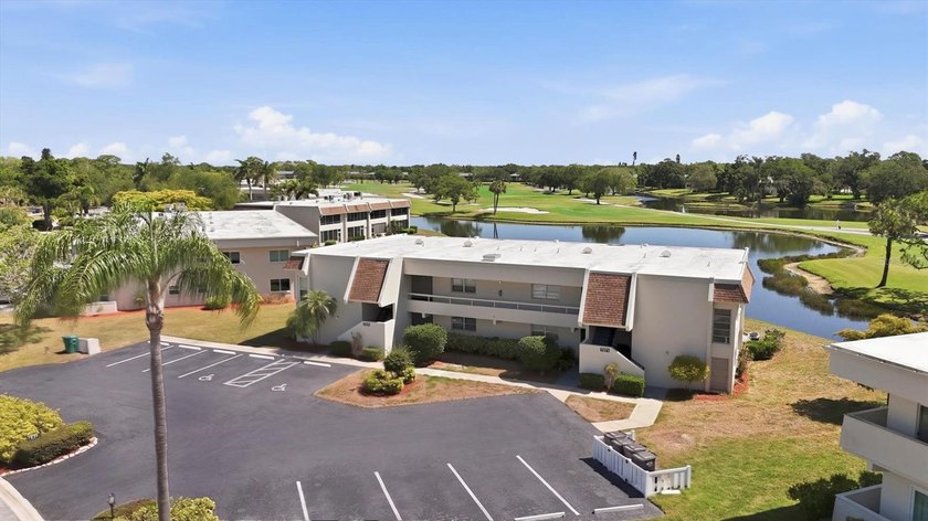 GOLF COURSE + WATER VIEWS = YOU'RE NEW FLORIDA OASIS! Welcome to - Beach Condo for sale in Sarasota, Florida on Beachhouse.com