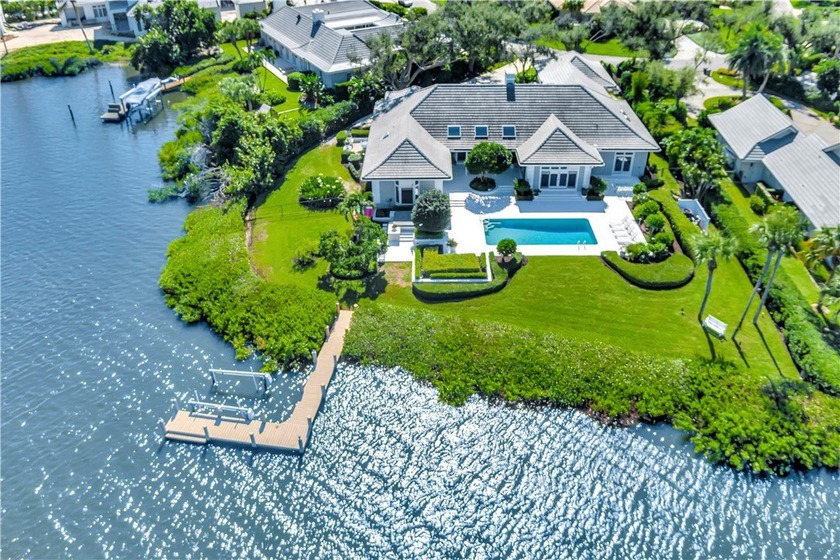 Sweeping water views define this waterfront property. Situated - Beach Home for sale in Vero Beach, Florida on Beachhouse.com