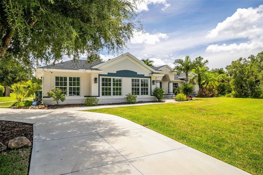 6 CAR DETACHED GARAGE & OVER 1.2 ACRES WITH RECENT REDUCTION! - Beach Home for sale in Port Charlotte, Florida on Beachhouse.com