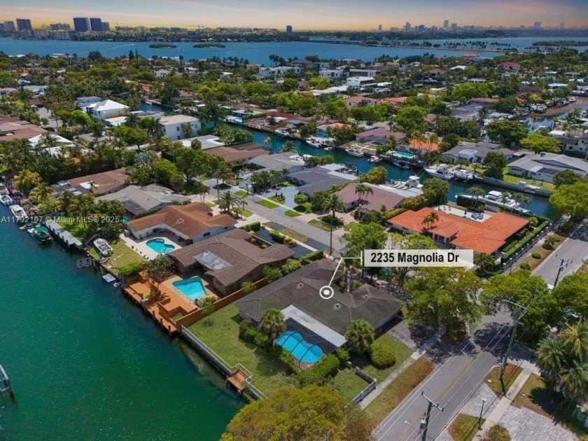 24-hour guard-gated community of Keystone Point, this rare - Beach Home for sale in North Miami, Florida on Beachhouse.com