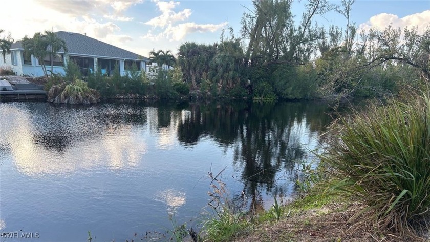 Welcome to your slice of paradise! This 80x100 freshwater canal - Beach Lot for sale in St. James City, Florida on Beachhouse.com