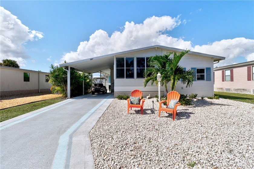 Discover this beautifully updated split-bedroom home featuring - Beach Home for sale in Barefoot Bay, Florida on Beachhouse.com