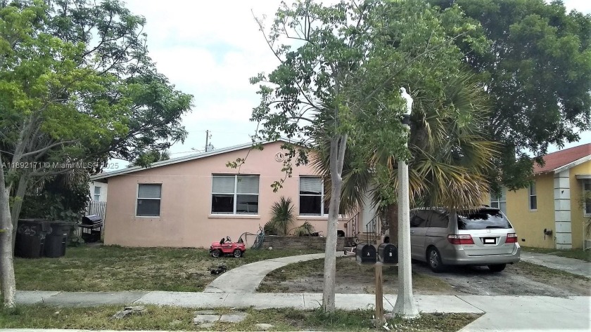Single Family Home with 2 incoming producing units 100% tenant - Beach Home for sale in West Palm Beach, Florida on Beachhouse.com