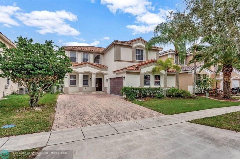 This executive home boasts four spacious bedrooms, all located - Beach Home for sale in Miramar, Florida on Beachhouse.com