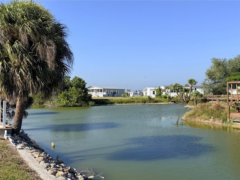WATERFRONT vacant lot located in the desirable 55+ community of - Beach Lot for sale in Englewood, Florida on Beachhouse.com