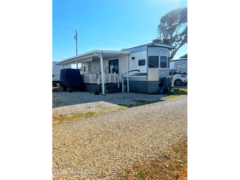 Adorable, newer camper with fabulous attached covered porch. 1 - Beach Lot for sale in North Topsail Beach, North Carolina on Beachhouse.com