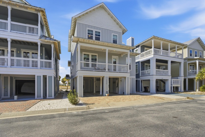 Located in a gated soundside community on Navarre Beach, this - Beach Home for sale in Navarre, Florida on Beachhouse.com