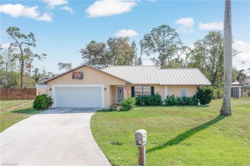 GREAT POOL HOME WITH CENTRAL WATER SITUATED ON .39 OF AN ACRE! - Beach Home for sale in Fort Myers, Florida on Beachhouse.com