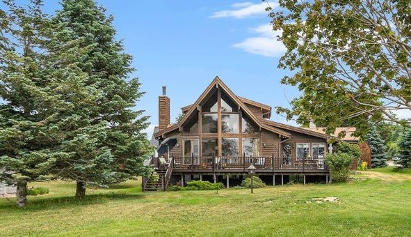 This beautiful home has 91 ft of private Lake Michigan Frontage - Beach Home for sale in Ludington, Michigan on Beachhouse.com
